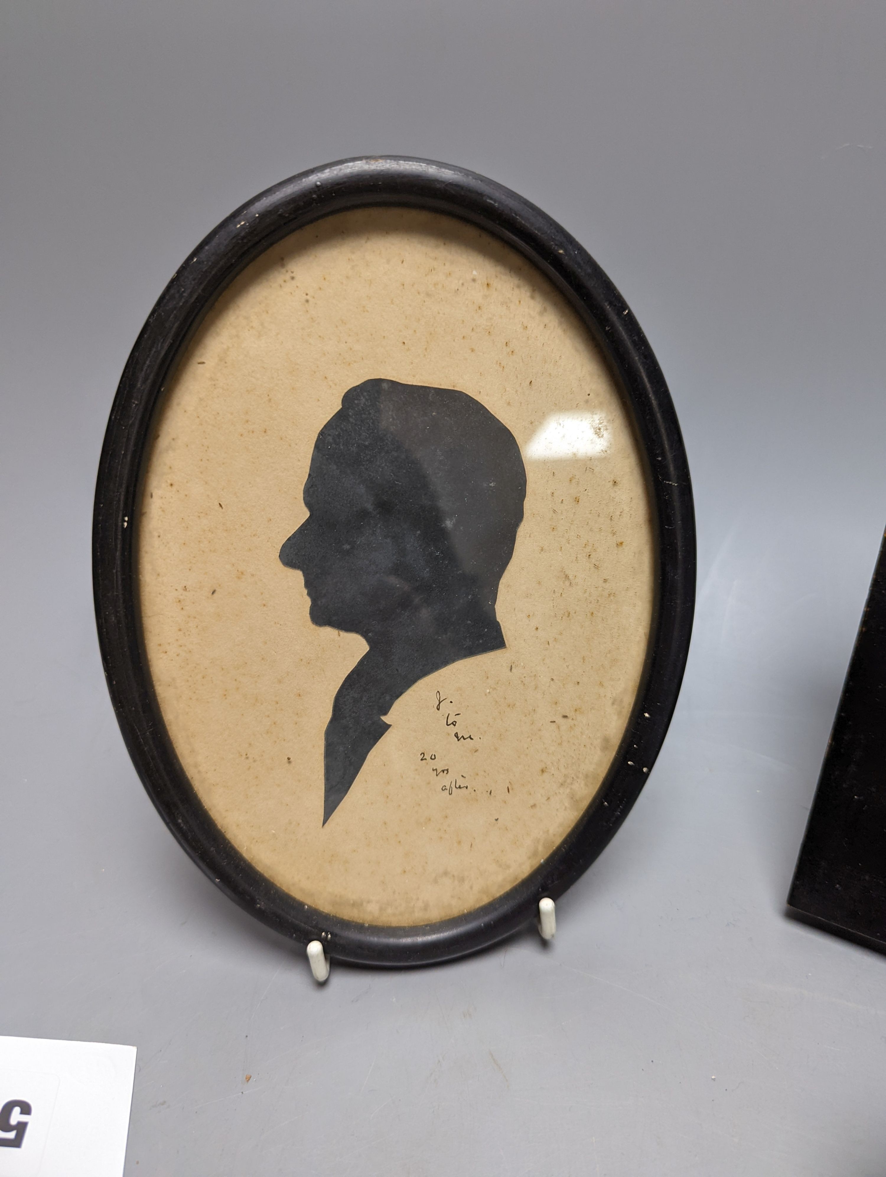 A plaster relief portrait, Samuel Pepys, frame 13cm., a Victorian portrait miniature on ivory, a silhouette portrait and a woven silk picture
